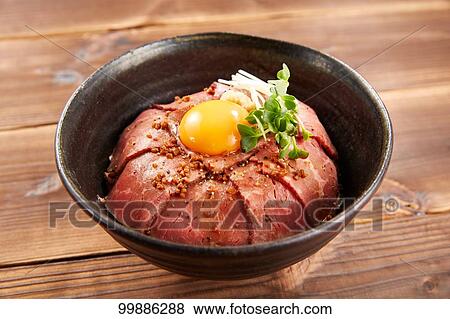 Stock Photo - Roast beef rice bowl. Fotosearch