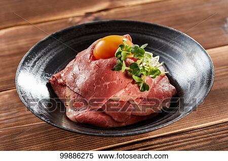 Stock Photography - Roast beef rice bowl. Fotosearch