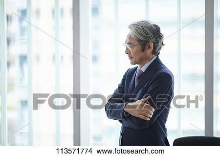 Picture - Senior Japanese businessman. Fotosearch
