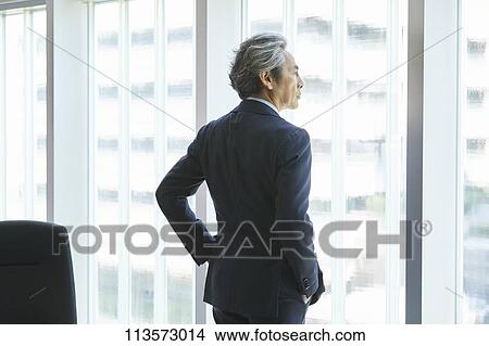 Picture - Senior Japanese businessman. Fotosearch