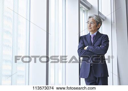 Picture - Senior Japanese businessman. Fotosearch