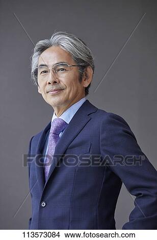 Picture - Senior Japanese businessman. Fotosearch