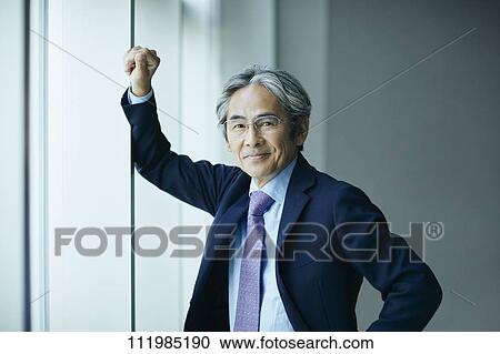 Stock Image - Senior Japanese businessman. Fotosearch