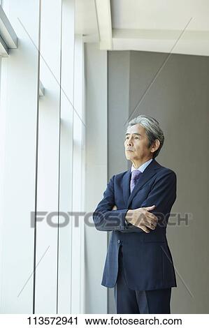 Stock Image - Senior Japanese businessman. Fotosearch