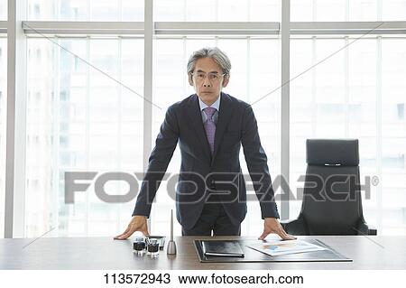 Stock Image - Senior Japanese businessman. Fotosearch