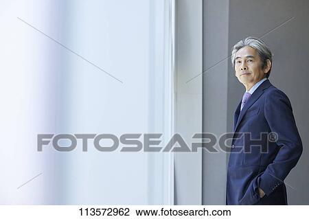 Stock Image - Senior Japanese businessman. Fotosearch