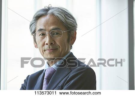 Stock Image - Senior Japanese businessman. Fotosearch