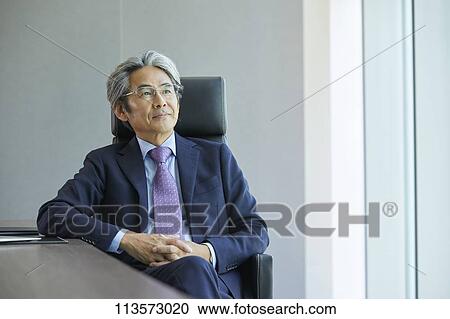 Stock Image - Senior Japanese businessman. Fotosearch