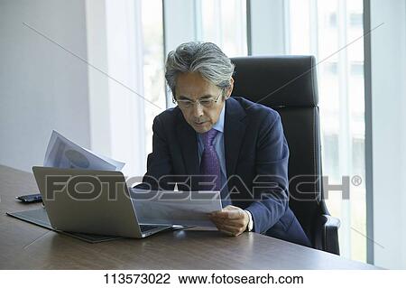 Stock Image - Senior Japanese businessman. Fotosearch