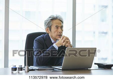 Senior Japanese businessman View Large Photo Image Stock Photo - Senior Japanese businessman. Fotosearch