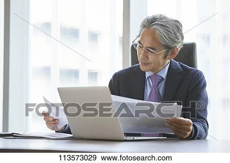 Stock Photo - Senior Japanese businessman. Fotosearch