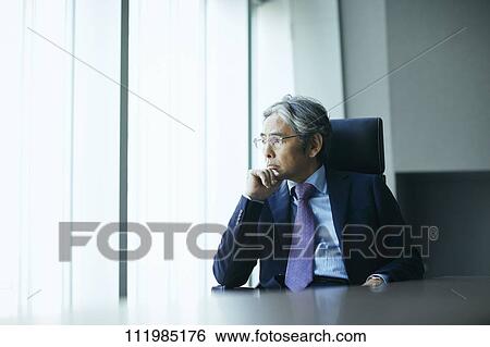 Stock Photograph - Senior Japanese businessman. Fotosearch