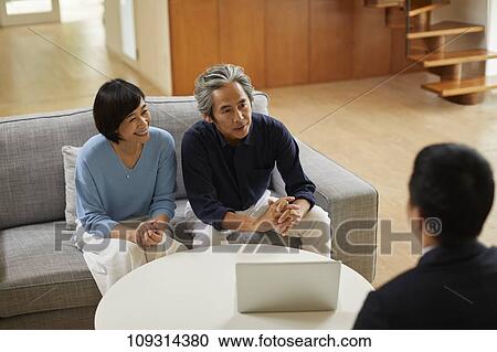 Senior Japanese couple at home with salesman View Large Photo Image Stock Image - Senior Japanese couple at home with salesman. Fotosearch