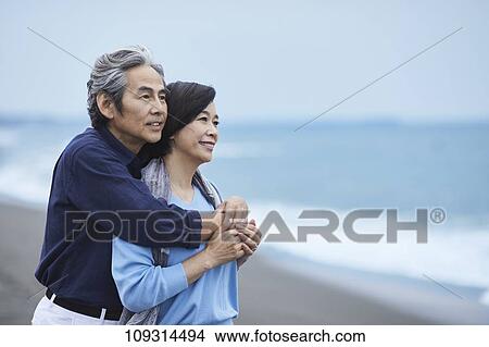 Senior Japanese couple at the beach View Large Photo Image Picture - Senior Japanese couple at the beach. Fotosearch