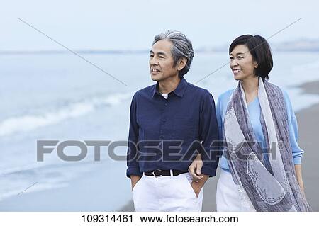 Senior Japanese couple at the beach View Large Photo Image Stock Image - Senior Japanese couple at the beach. Fotosearch