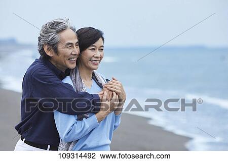 Senior Japanese couple at the beach View Large Photo Image Stock Image - Senior Japanese couple at the beach. Fotosearch