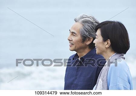 Senior Japanese couple at the beach View Large Photo Image Stock Photo - Senior Japanese couple at the beach. Fotosearch