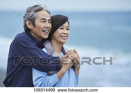 Senior Japanese couple at the beach View Large Photo Image Stock Photo - Senior Japanese couple at the beach. Fotosearch