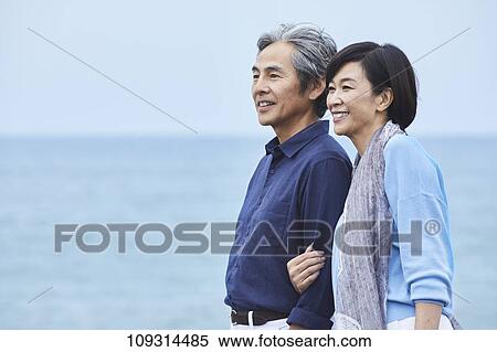 Senior Japanese couple at the beach View Large Photo Image Stock Photography - Senior Japanese couple at the beach. Fotosearch