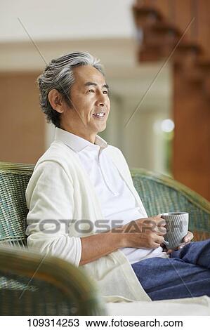 Senior Japanese man at home View Large Photo Image Stock Image - Senior Japanese man at home. Fotosearch