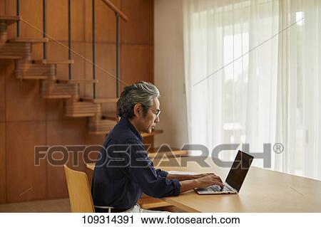 Senior Japanese man at home View Large Photo Image Stock Image - Senior Japanese man at home. Fotosearch