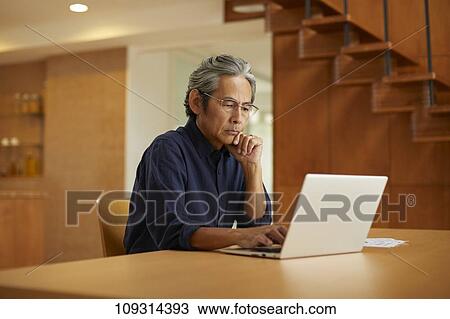 Senior Japanese man at home View Large Photo Image Stock Image - Senior Japanese man at home. Fotosearch