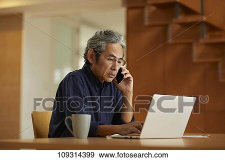 Senior Japanese man at home View Large Photo Image Stock Photo - Senior Japanese man at home. Fotosearch
