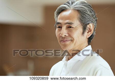 Senior Japanese man at home View Large Photo Image Stock Photo - Senior Japanese man at home. Fotosearch