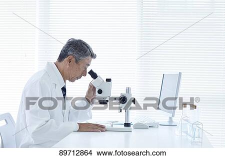 Senior Japanese researcher in the lab View Large Photo Image Picture - Senior Japanese researcher in the lab. Fotosearch