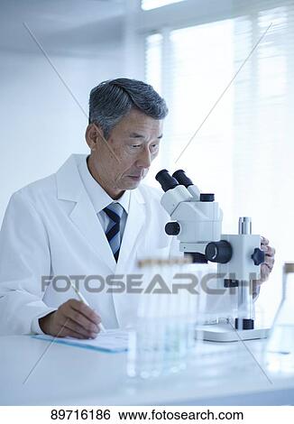 Senior Japanese researcher in the lab View Large Photo Image Stock Photograph - Senior Japanese researcher in the lab. Fotosearch