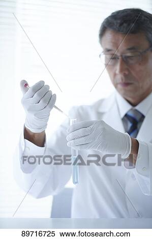 Senior Japanese researcher in the lab View Large Photo Image Stock Photography - Senior Japanese researcher in the lab. Fotosearch
