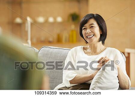 Stock Photo - Senior Japanese woman at home. Fotosearch