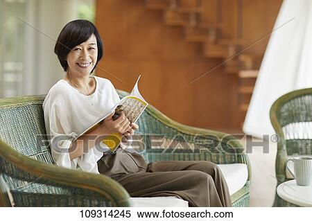 Stock Photography - Senior Japanese woman at home. Fotosearch