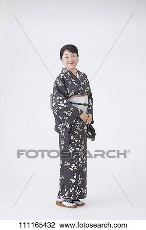 Senior Japanese woman wearing kimono View Large Photo Image Stock Image - Senior Japanese woman wearing kimono. Fotosearch