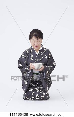 Stock Photo - Senior Japanese woman wearing kimono. Fotosearch