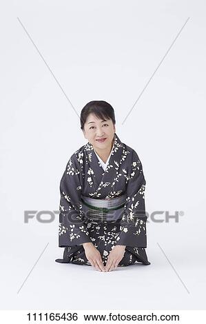 Stock Photograph - Senior Japanese woman wearing kimono. Fotosearch