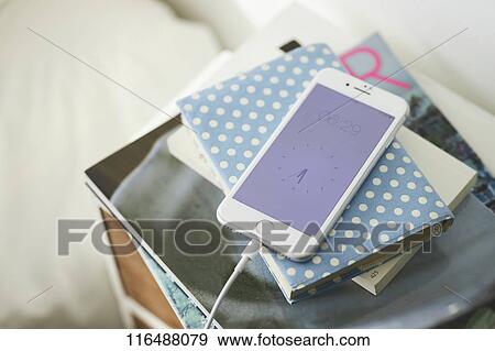 Smartphone in a bedroom View Large Photo Image Stock Photo - Smartphone in a bedroom. Fotosearch