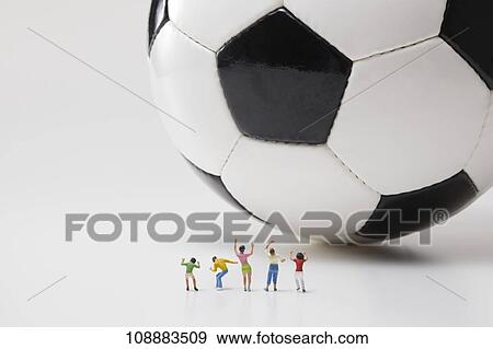 Stock Photo - Sporting equipment and miniatures. Fotosearch