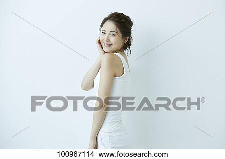 Studio portrait of attractive young Japanese woman View Large Photo Image Picture - Studio portrait of attractive young Japanese woman. Fotosearch