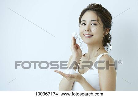 Studio portrait of attractive young Japanese woman View Large Photo Image Picture - Studio portrait of attractive young Japanese woman. Fotosearch