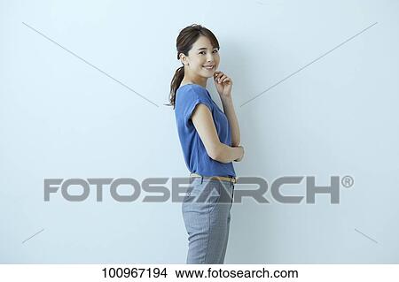Studio portrait of attractive young Japanese woman View Large Photo Image Picture - Studio portrait of attractive young Japanese woman. Fotosearch