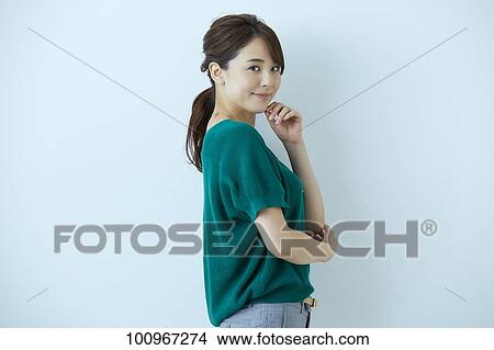 Studio portrait of attractive young Japanese woman View Large Photo Image Picture - Studio portrait of attractive young Japanese woman. Fotosearch