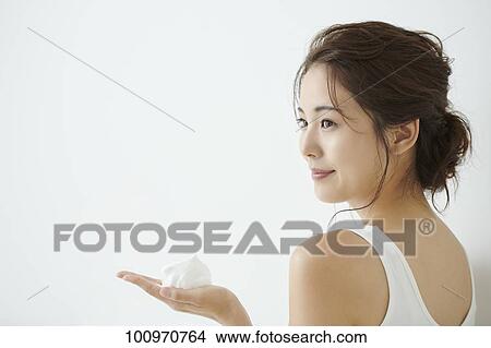 Studio portrait of attractive young Japanese woman View Large Photo Image Picture - Studio portrait of attractive young Japanese woman. Fotosearch