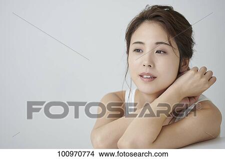 Studio portrait of attractive young Japanese woman View Large Photo Image Picture - Studio portrait of attractive young Japanese woman. Fotosearch