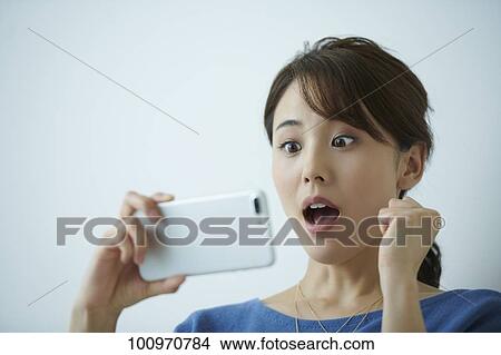 Studio portrait of attractive young Japanese woman View Large Photo Image Picture - Studio portrait of attractive young Japanese woman. Fotosearch