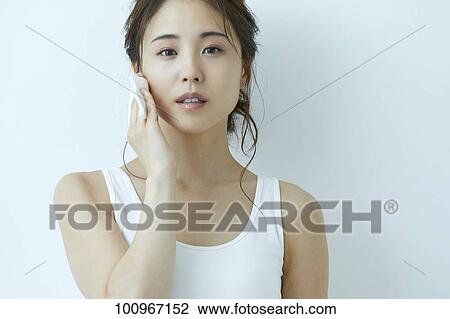 Studio portrait of attractive young Japanese woman View Large Photo Image Stock Image - Studio portrait of attractive young Japanese woman. Fotosearch