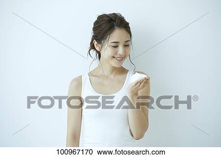Studio portrait of attractive young Japanese woman View Large Photo Image Stock Image - Studio portrait of attractive young Japanese woman. Fotosearch