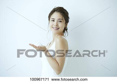Studio portrait of attractive young Japanese woman View Large Photo Image Stock Image - Studio portrait of attractive young Japanese woman. Fotosearch
