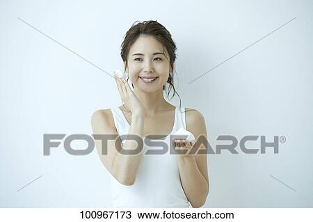 Studio portrait of attractive young Japanese woman View Large Photo Image Stock Image - Studio portrait of attractive young Japanese woman. Fotosearch