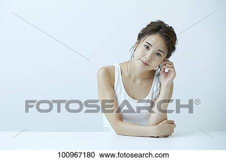 Studio portrait of attractive young Japanese woman View Large Photo Image Stock Image - Studio portrait of attractive young Japanese woman. Fotosearch